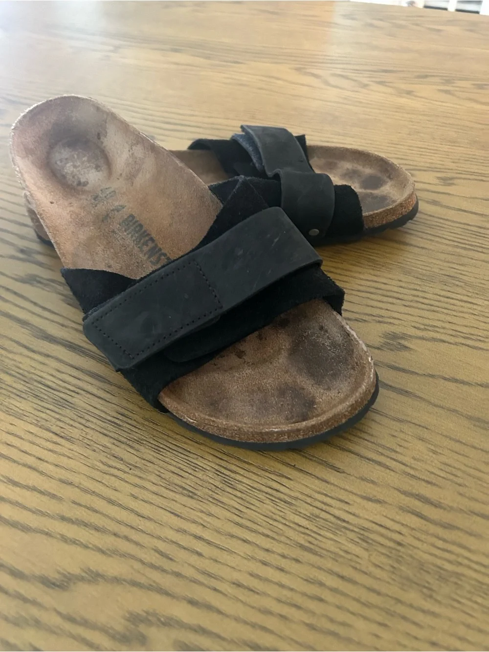 Birkenstock black slide sandals.